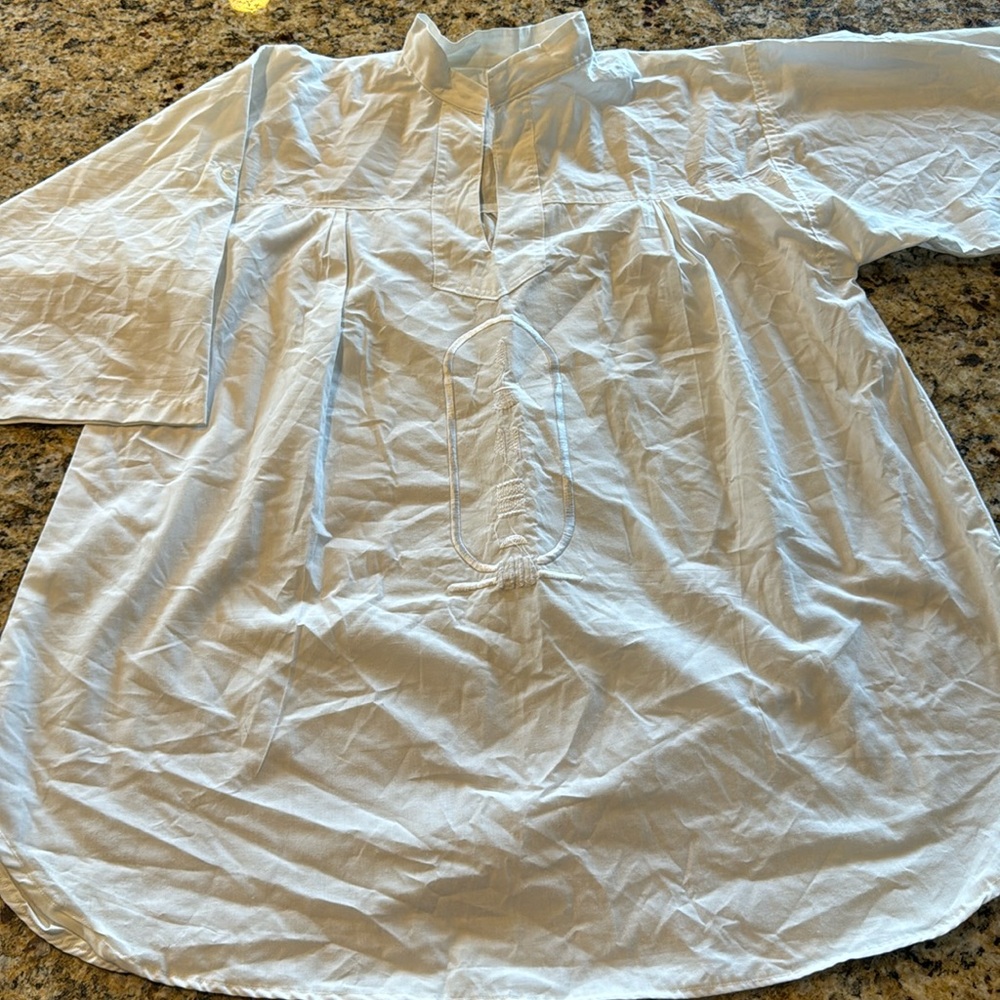 Men’s Egyptian shirt with cartouche.